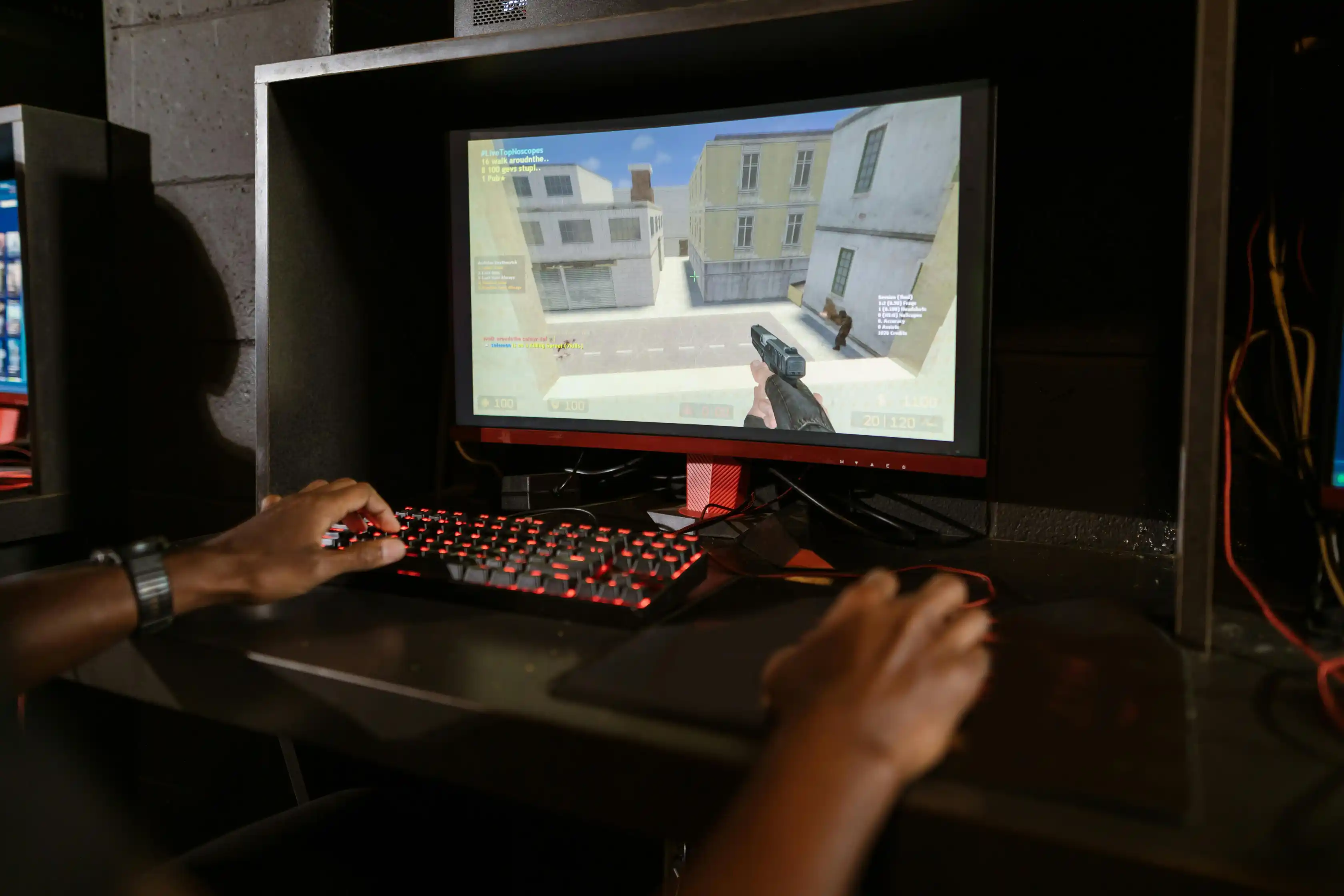 A boy is in online gaming with a desktop